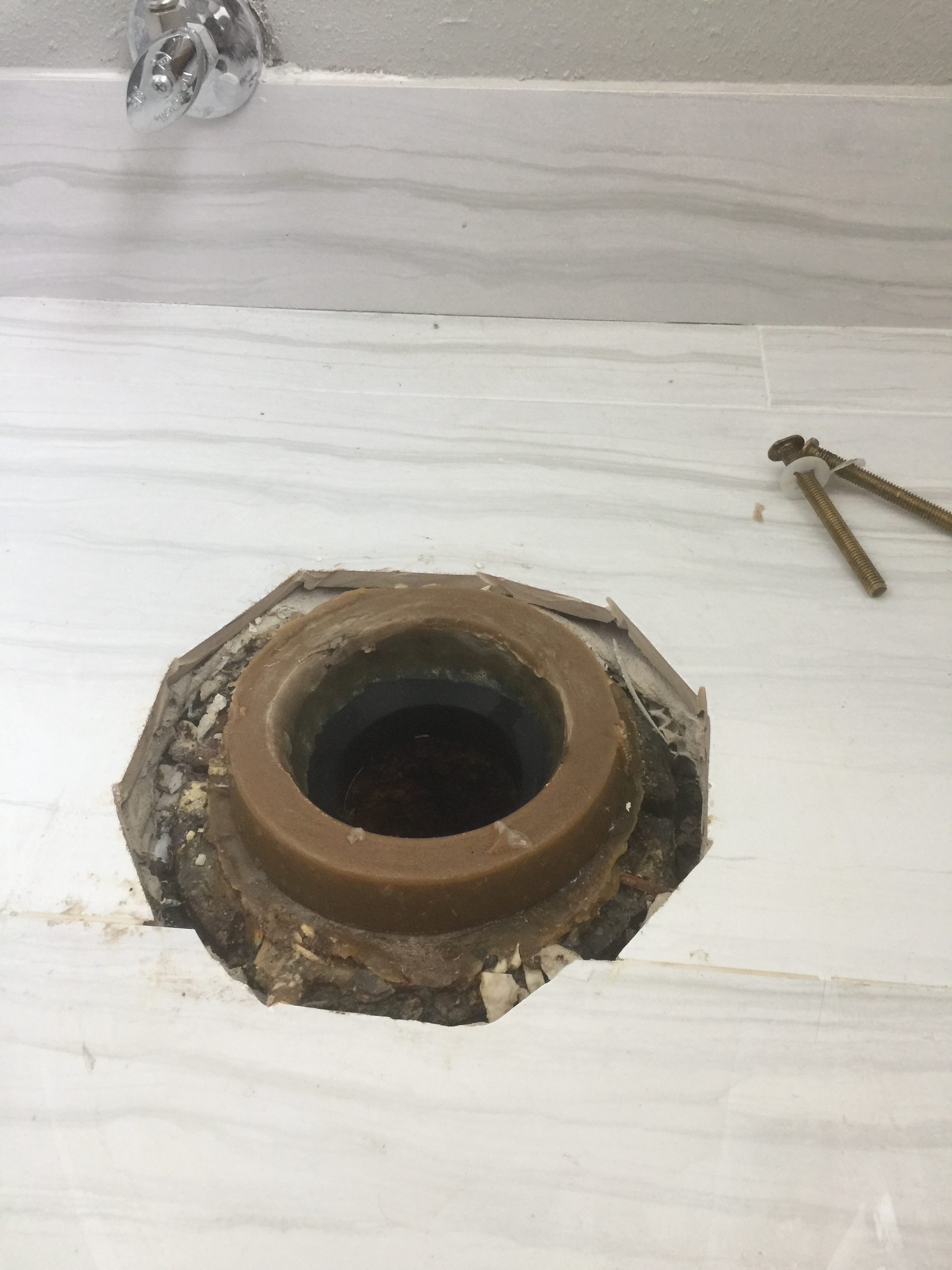 Improper installation of wax toilet ring seal